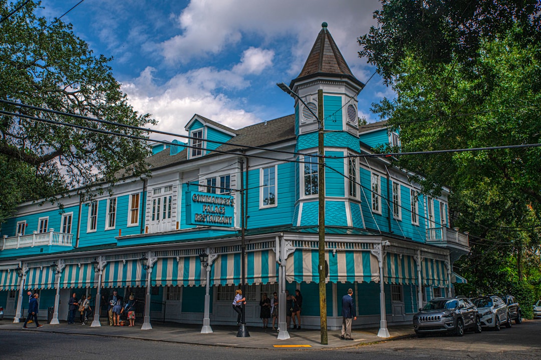 The weathered facade of a historic New Orleans home under an overcast sky, subtly suggesting the underlying structural and legal risks discussed in the blog post.